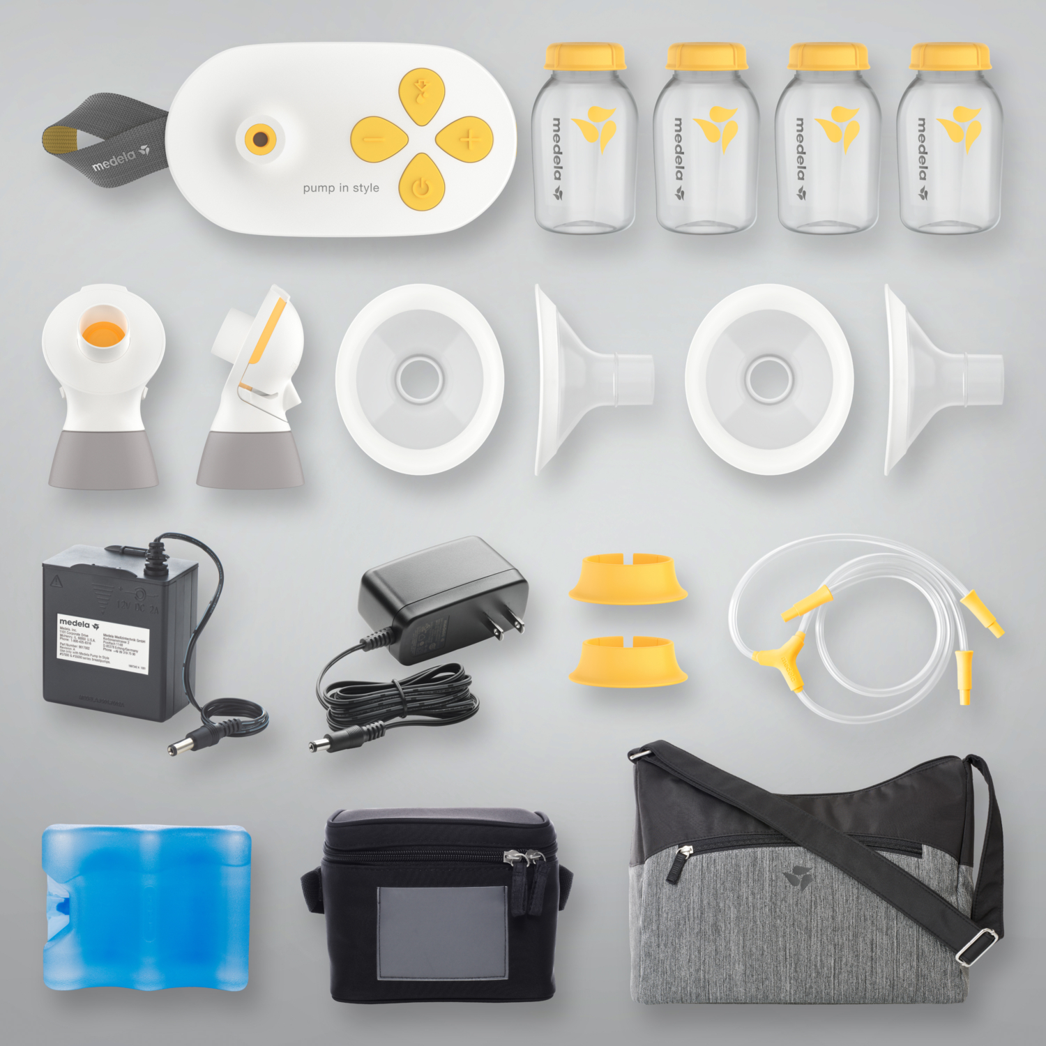 Medela Pump in style with Maxflow Breast pump with all of the parts and supplies laid out